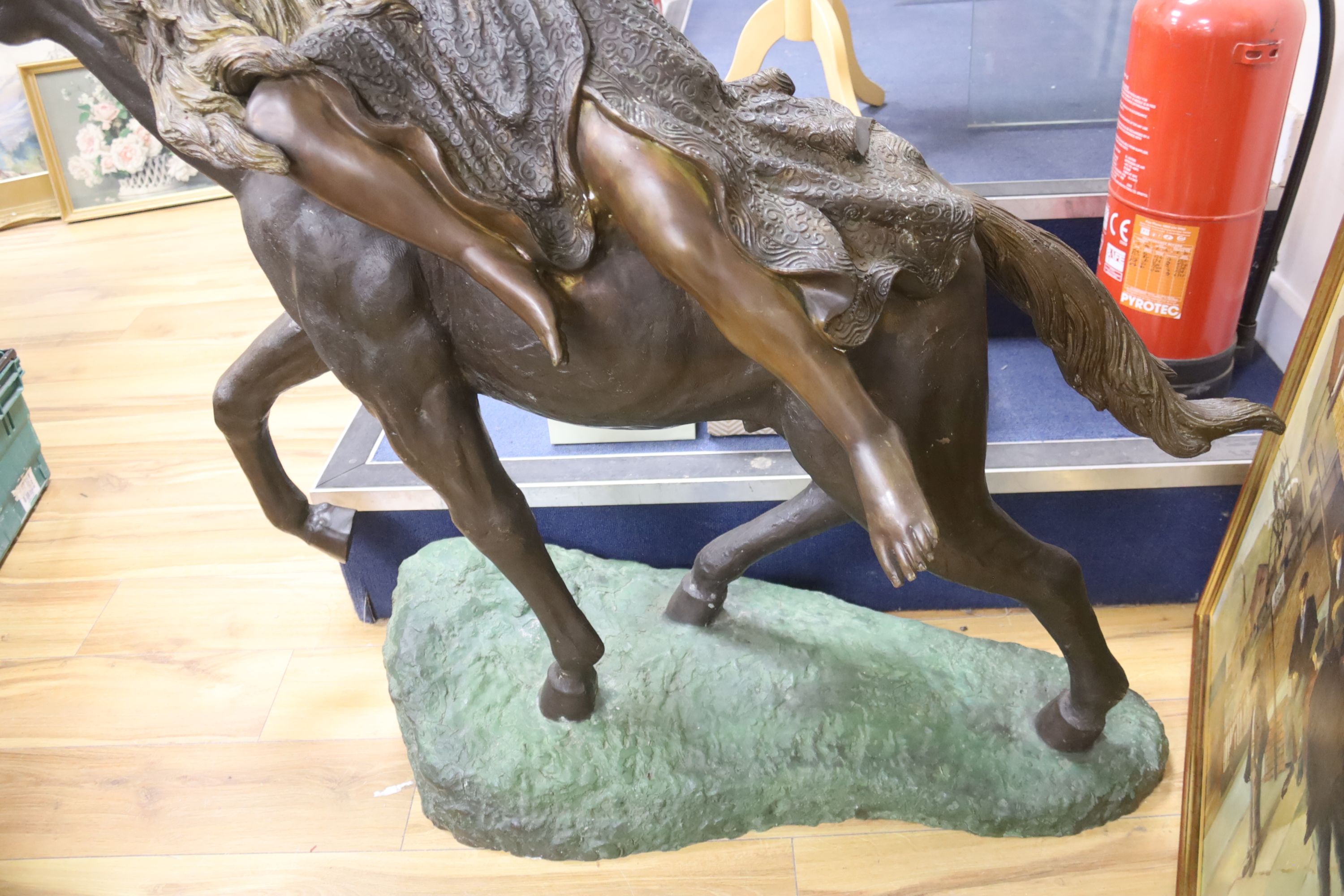 A large bronze of a Valkyrie on horseback, width 135cm height 122cm